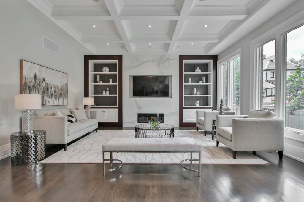 Bright living room with a marble fireplace